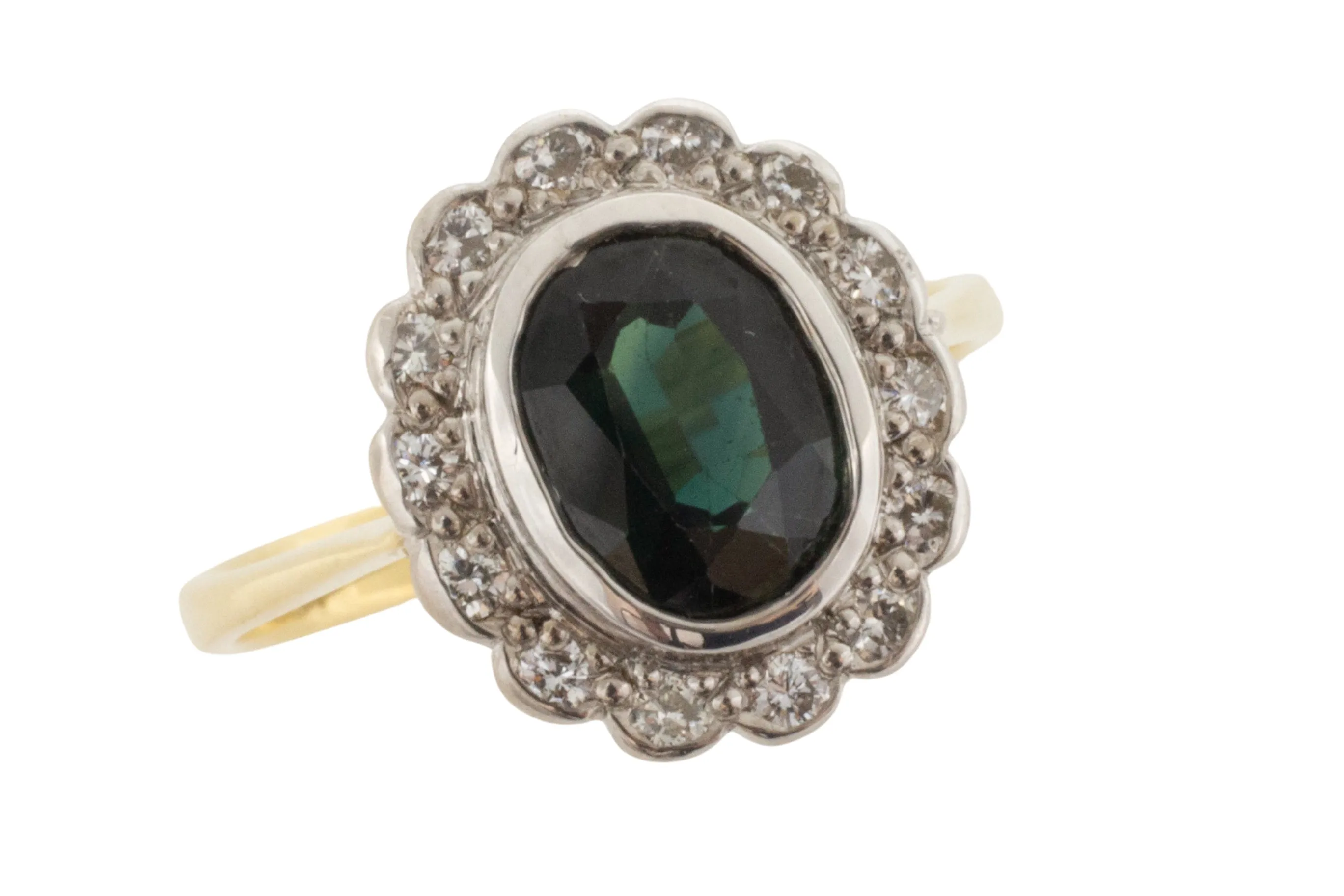 Vintage green sapphire and diamond cluster ring