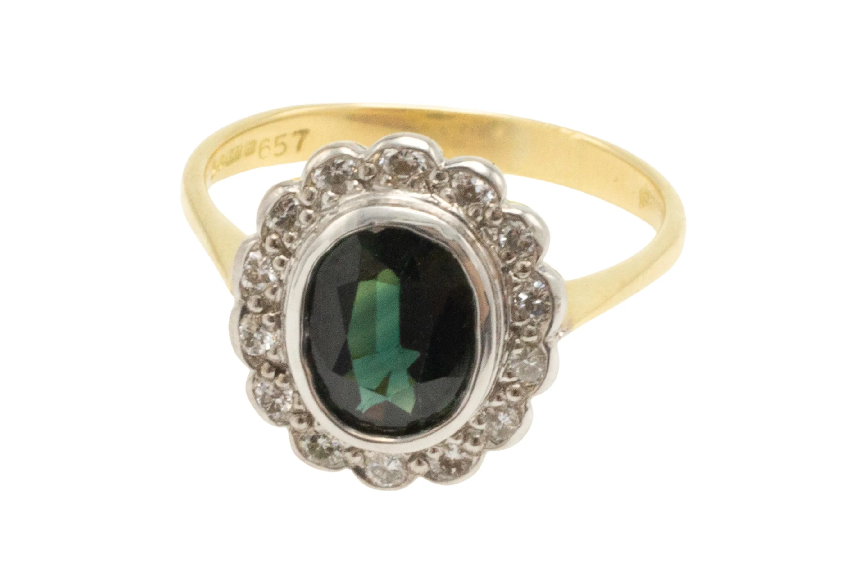 Vintage green sapphire and diamond cluster ring