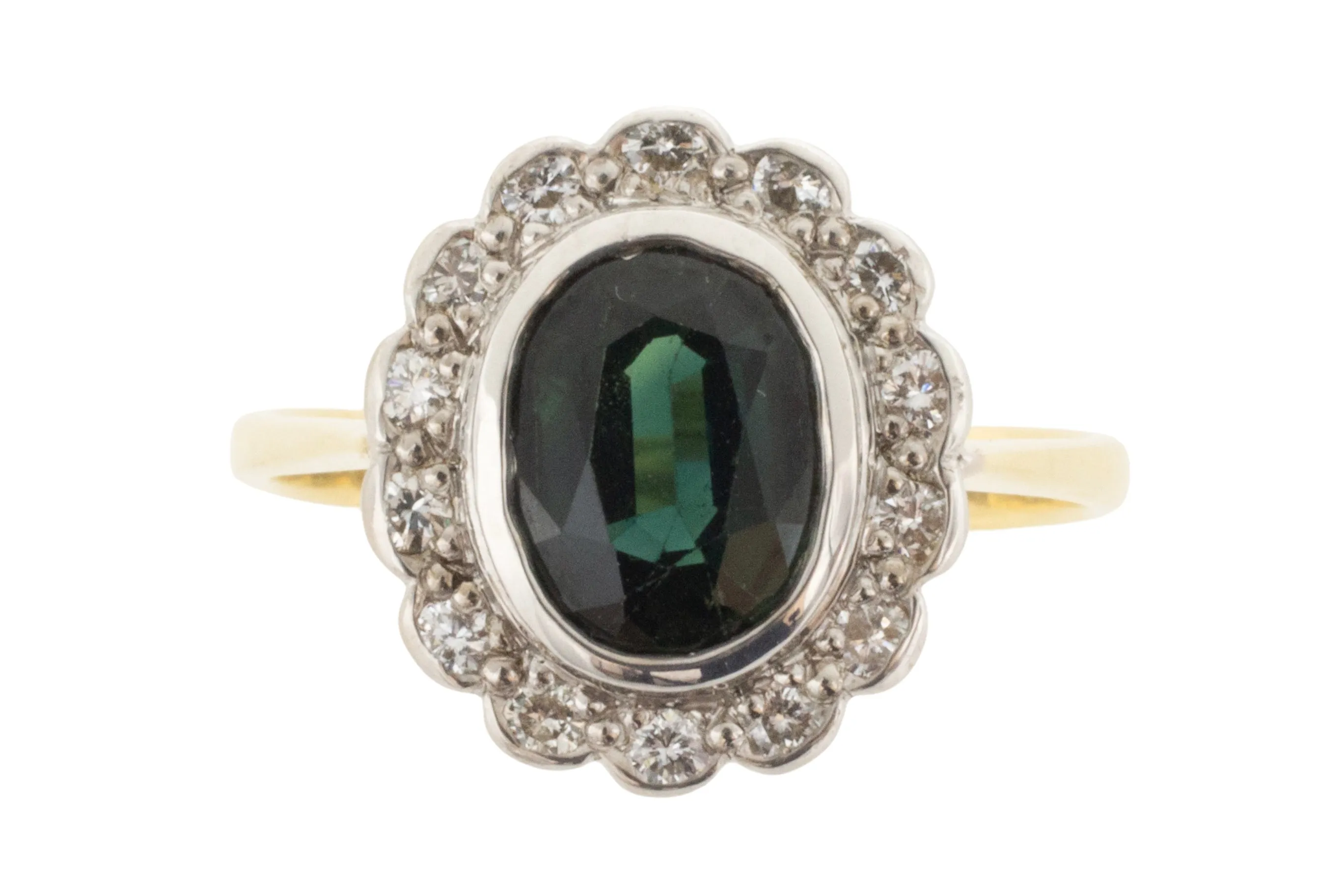 Vintage green sapphire and diamond cluster ring