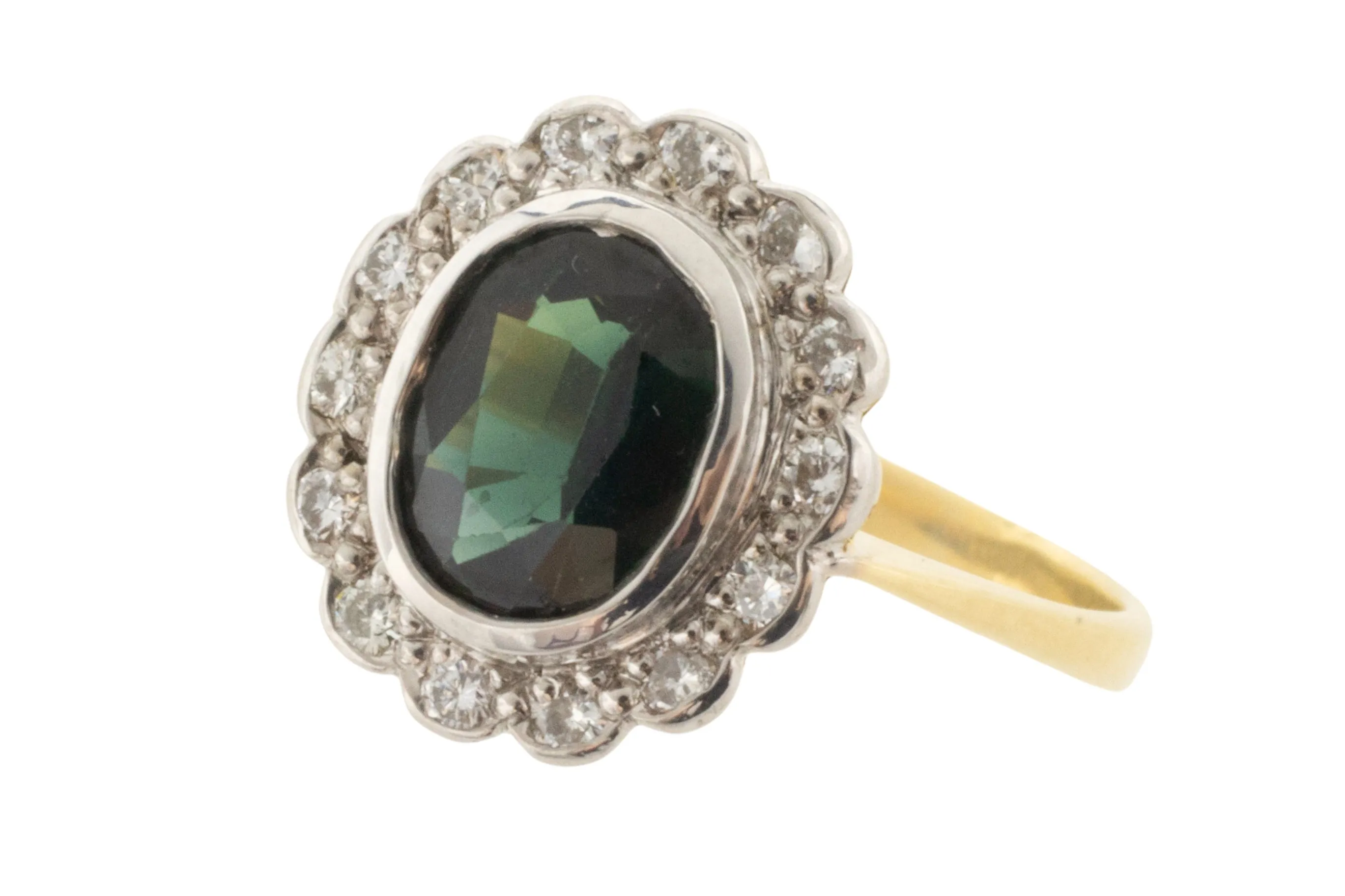 Vintage green sapphire and diamond cluster ring